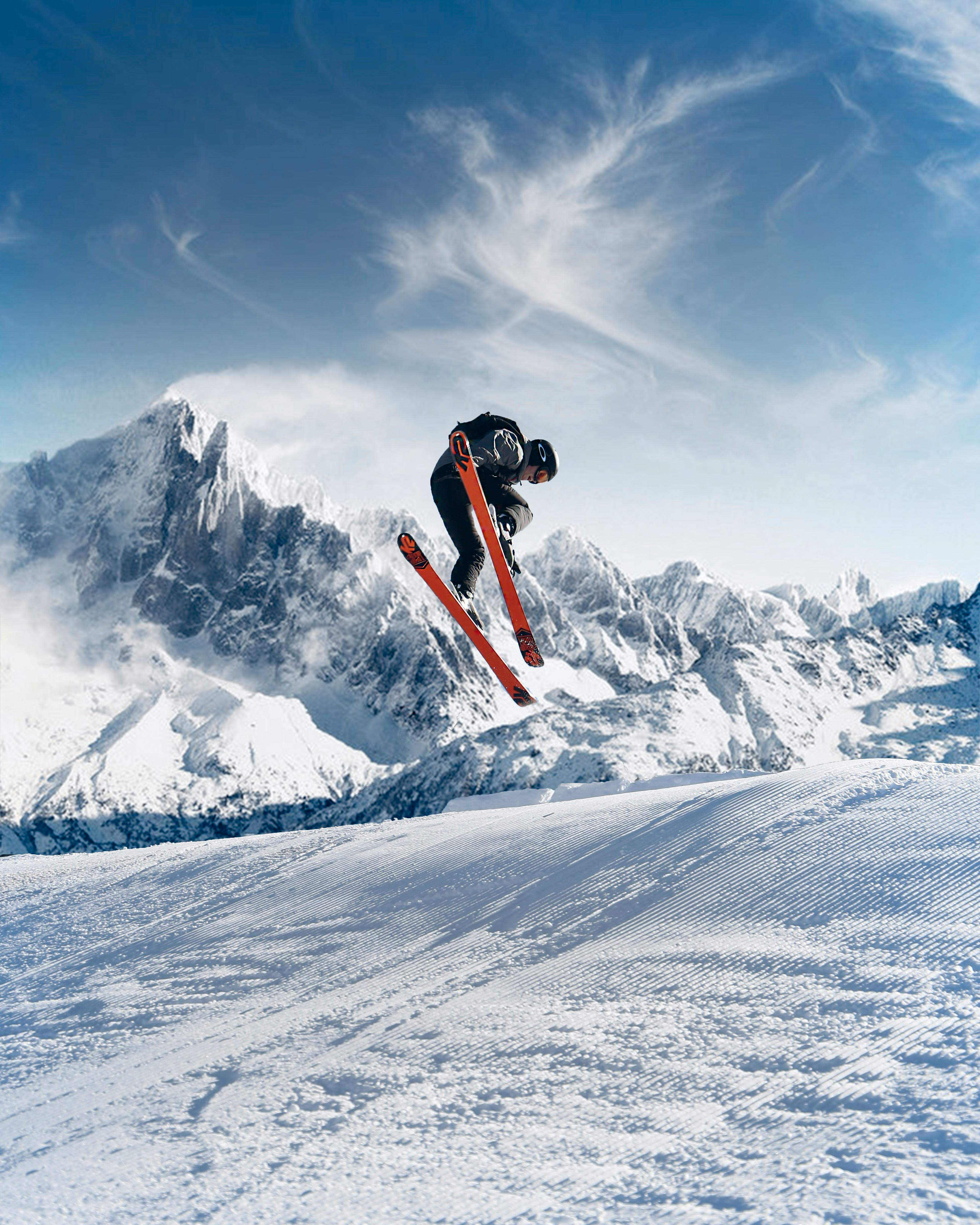 A person skiing down a snowy mountain slope